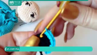 بافت عروسک دختر با موهای فر