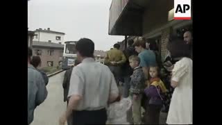 BOSNIA: SARAJEVO: 100 BOSNIAN REFUGEES RETURN HOME FROM TURKEY