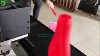 چاپ روی سس کچاپ توسط جت پرینتر اتوماتیک مدل  + DCN 150 A